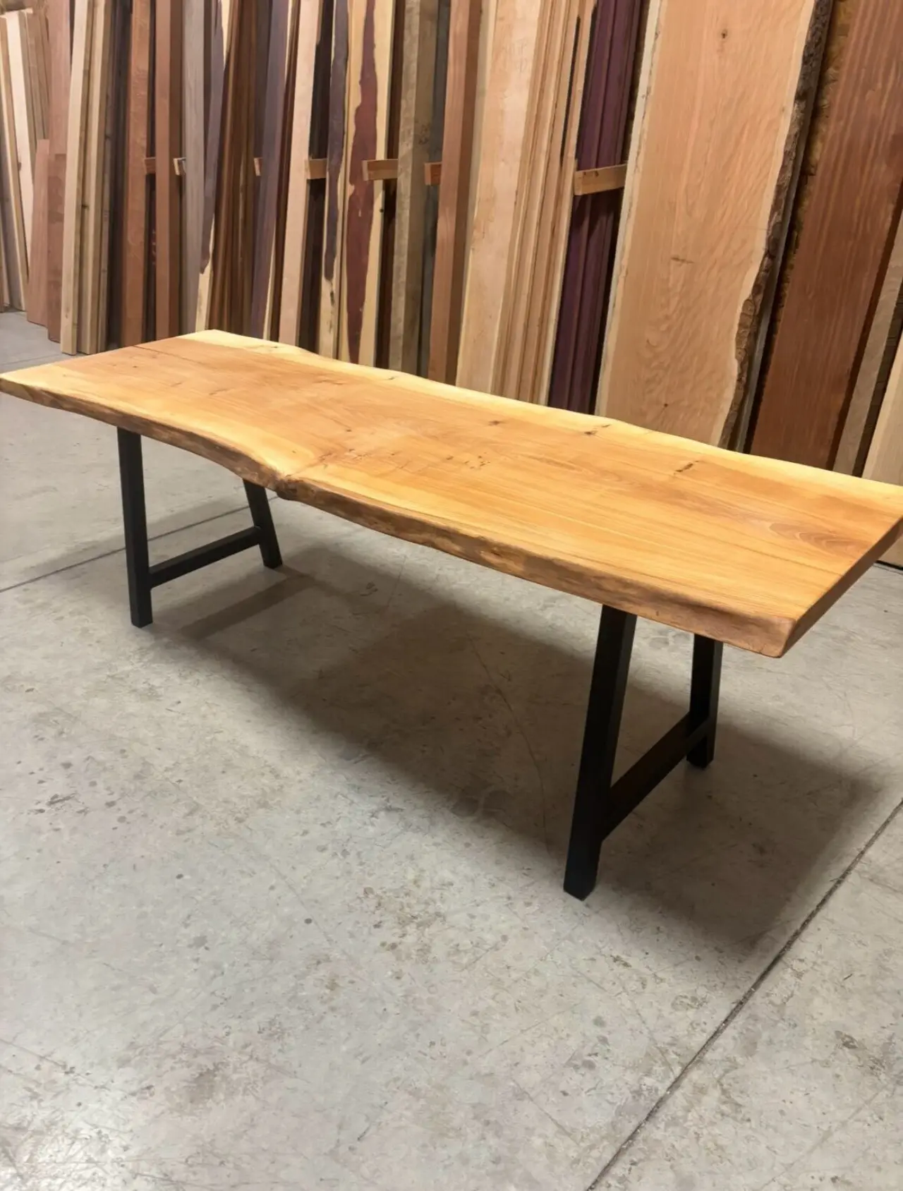 Live-edge table built from yard stock.