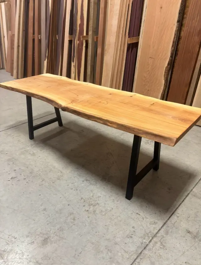 Live-edge table in the showroom.